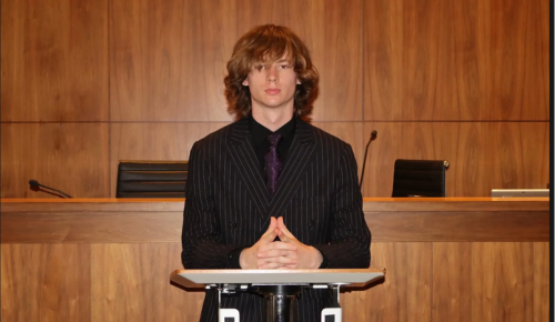 S1 Justice Samuel Brooksbank podium.png